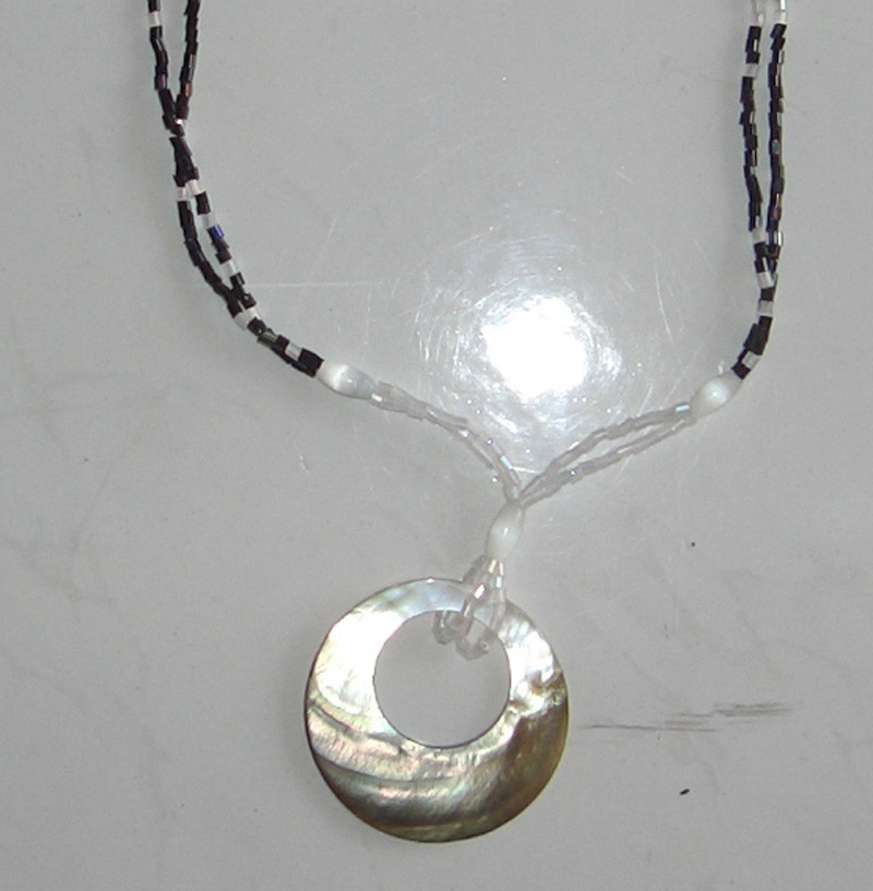 Necklace Black Shell Hole Aroud